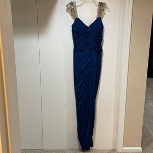 Navy, full length, lined, zipper back, semi “train” in back, gathered side front